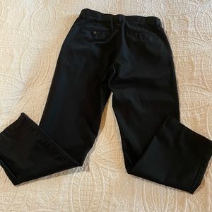 Men’s black pants.